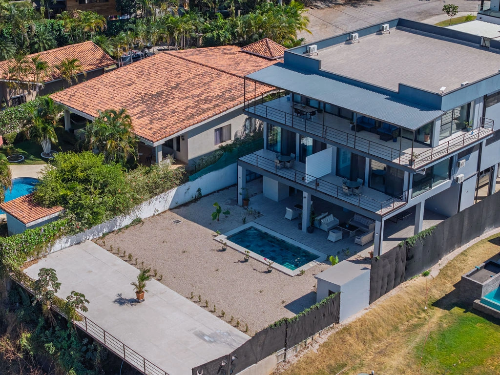 The best custom home builder in Costa Rica Decentra Homes Casa dos Hermanas Exterior Birdseye view of turnkey property